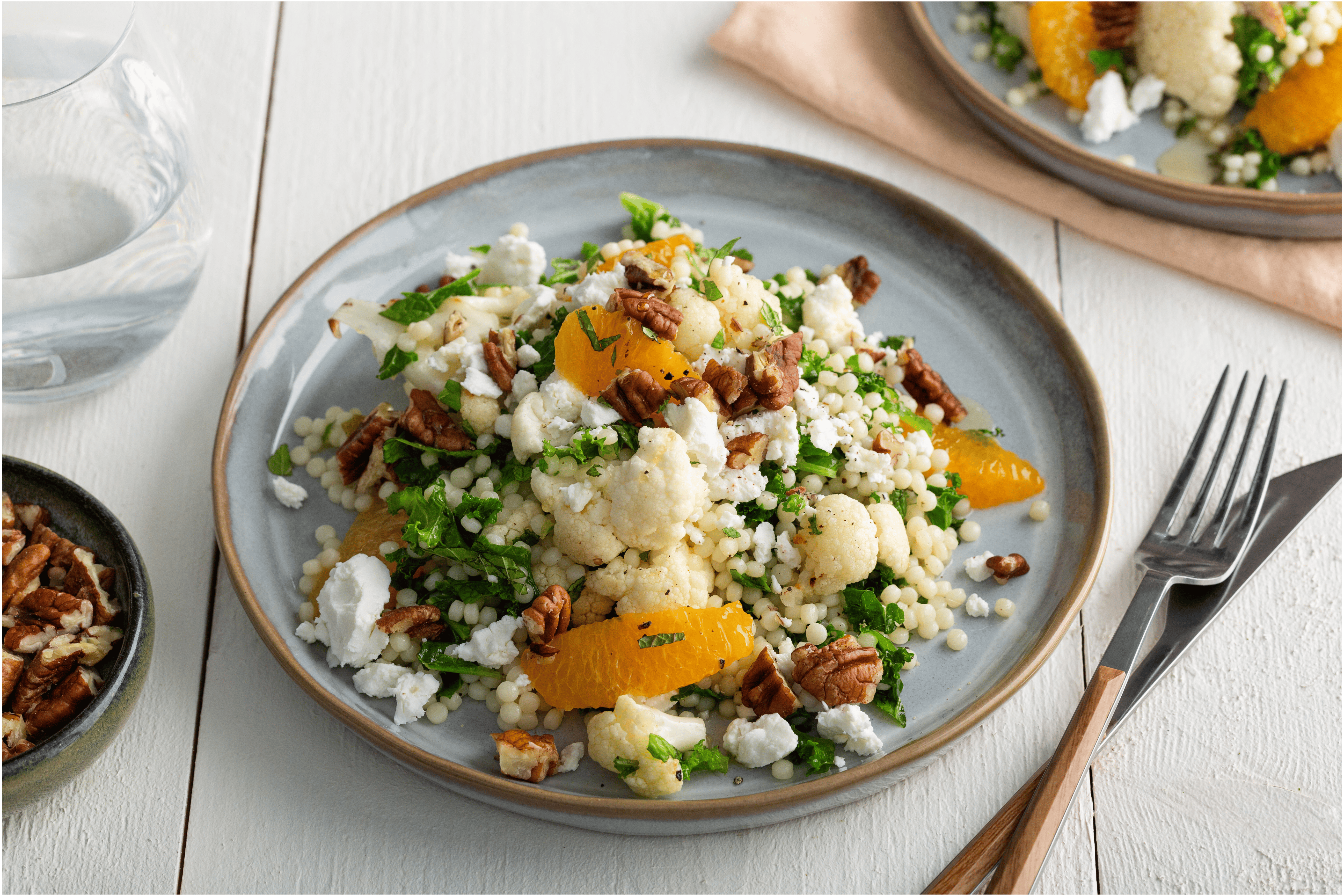 Parelcouscous met bloemkool, mineola en geitenkaas