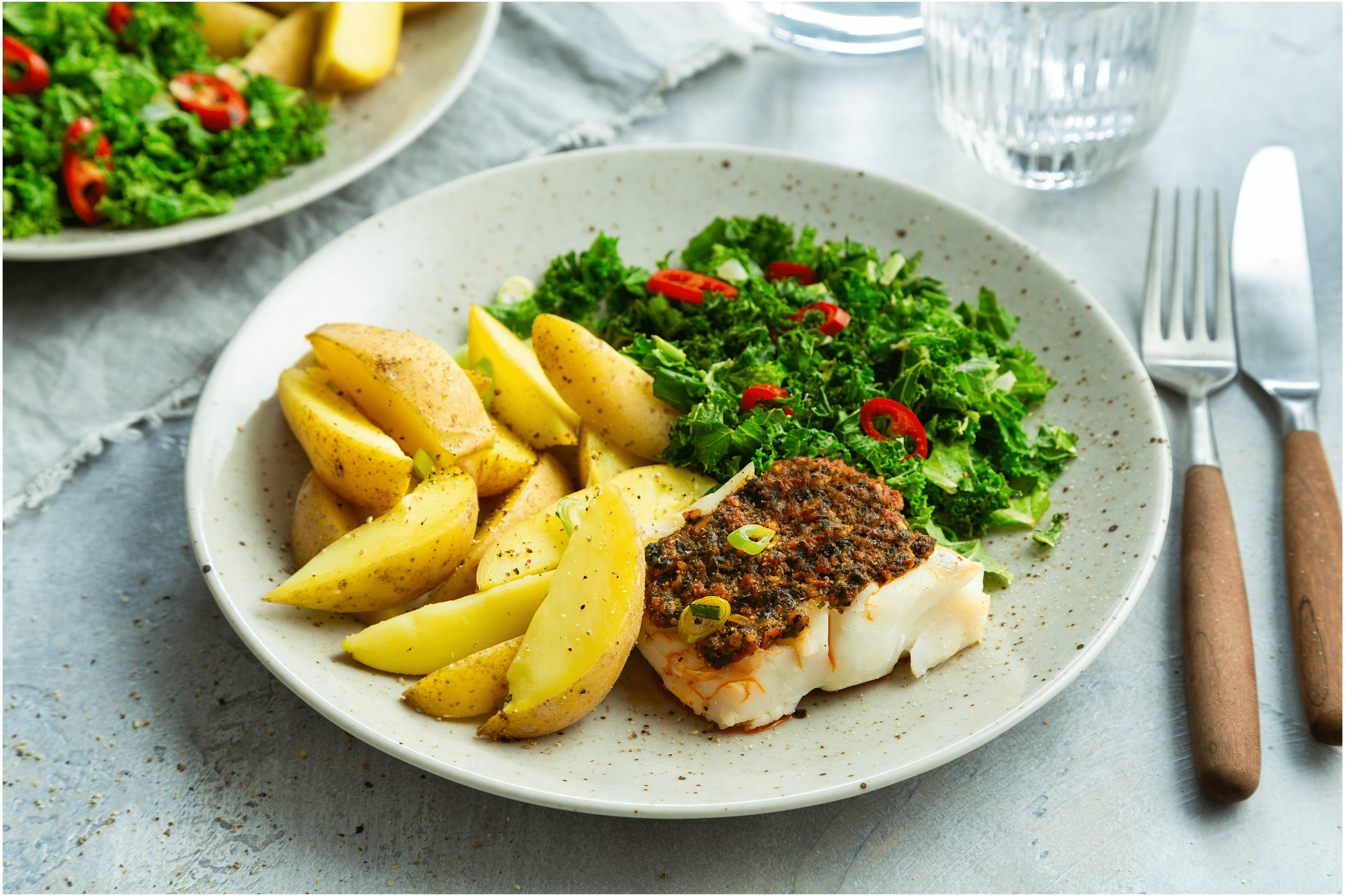 Kabeljauwfilet met rode pesto en roergebakken boerenkool