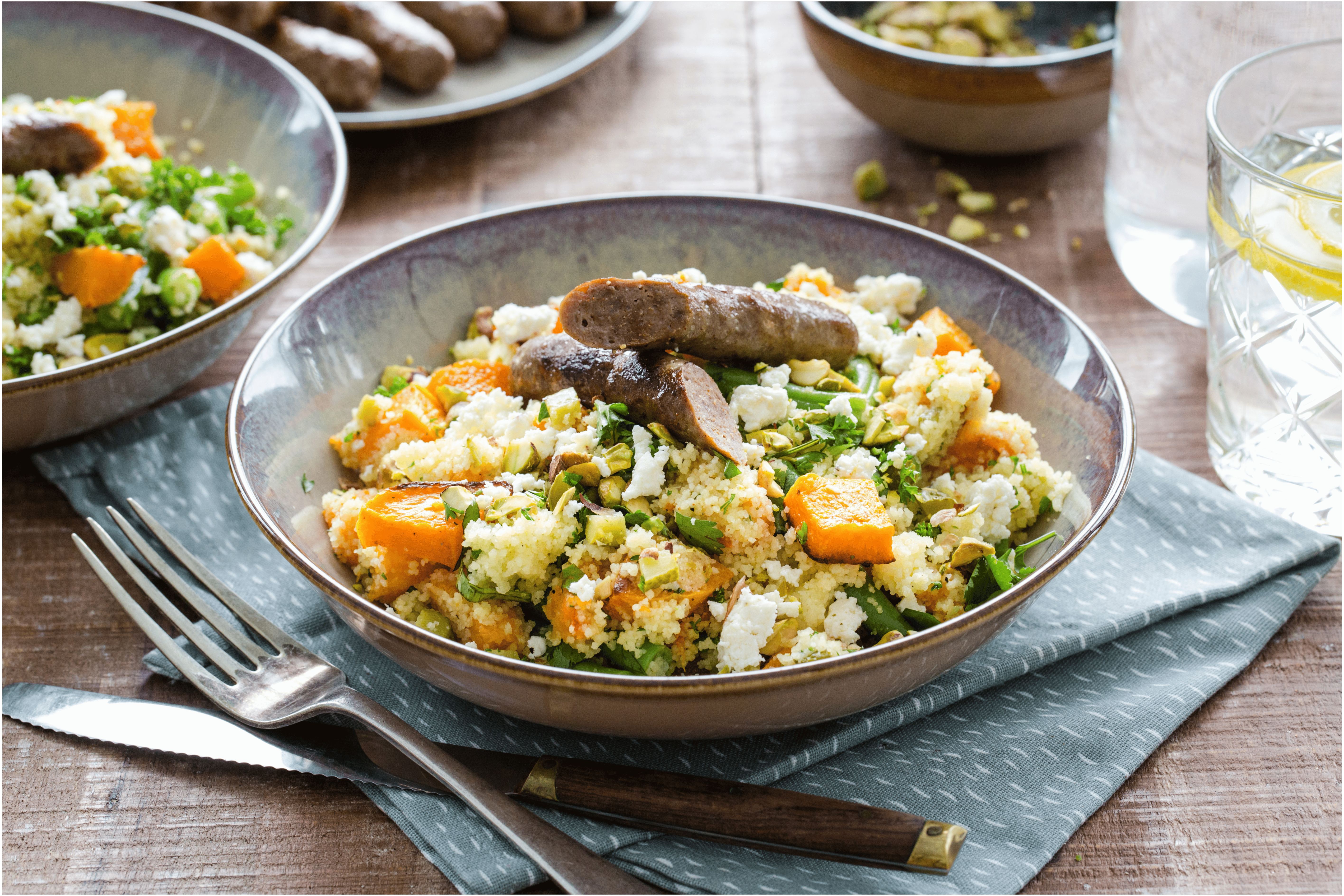 Kruidige couscous met geroosterde pompoen en runderchipolata