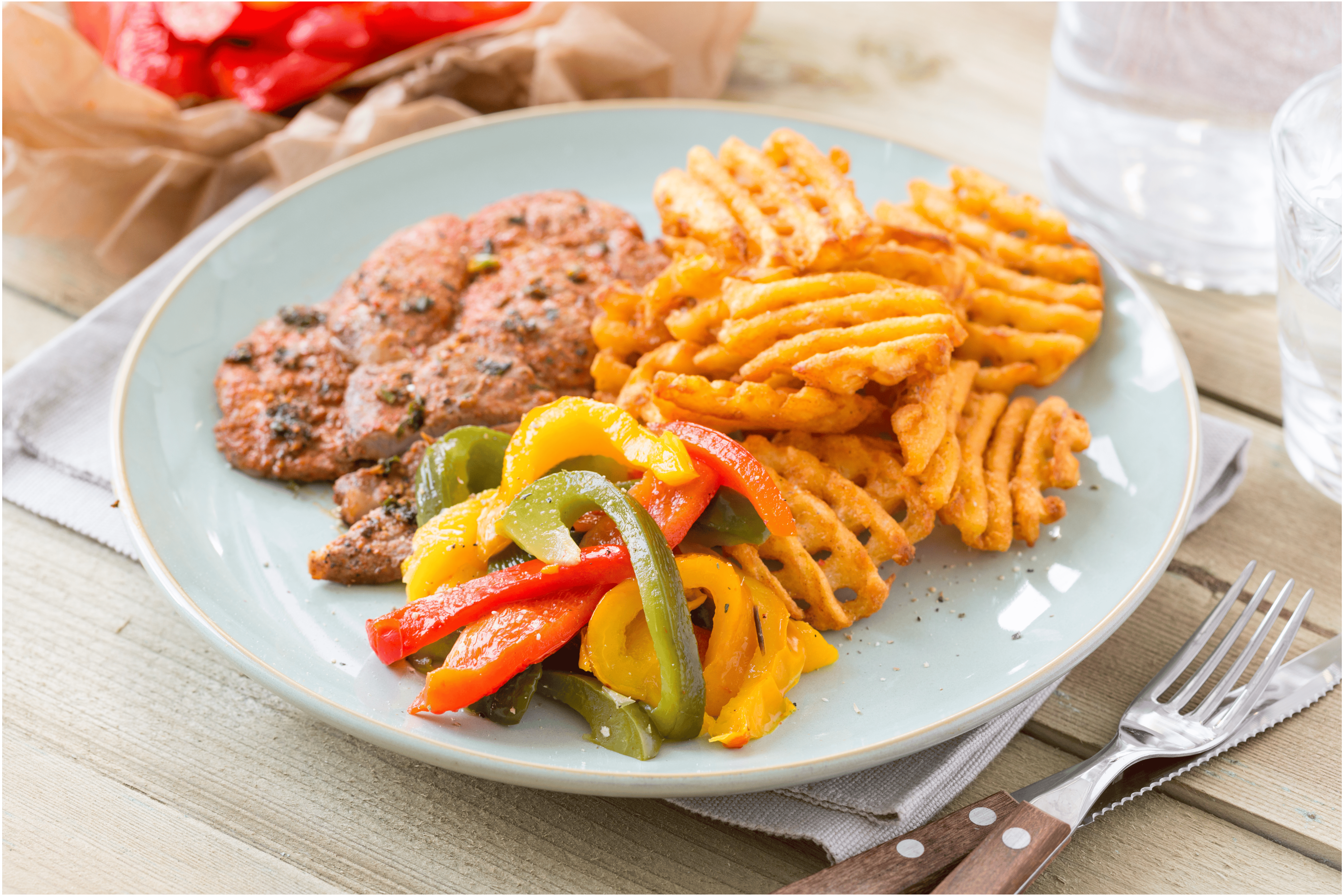 Procureurlapjes met geroosterde paprika