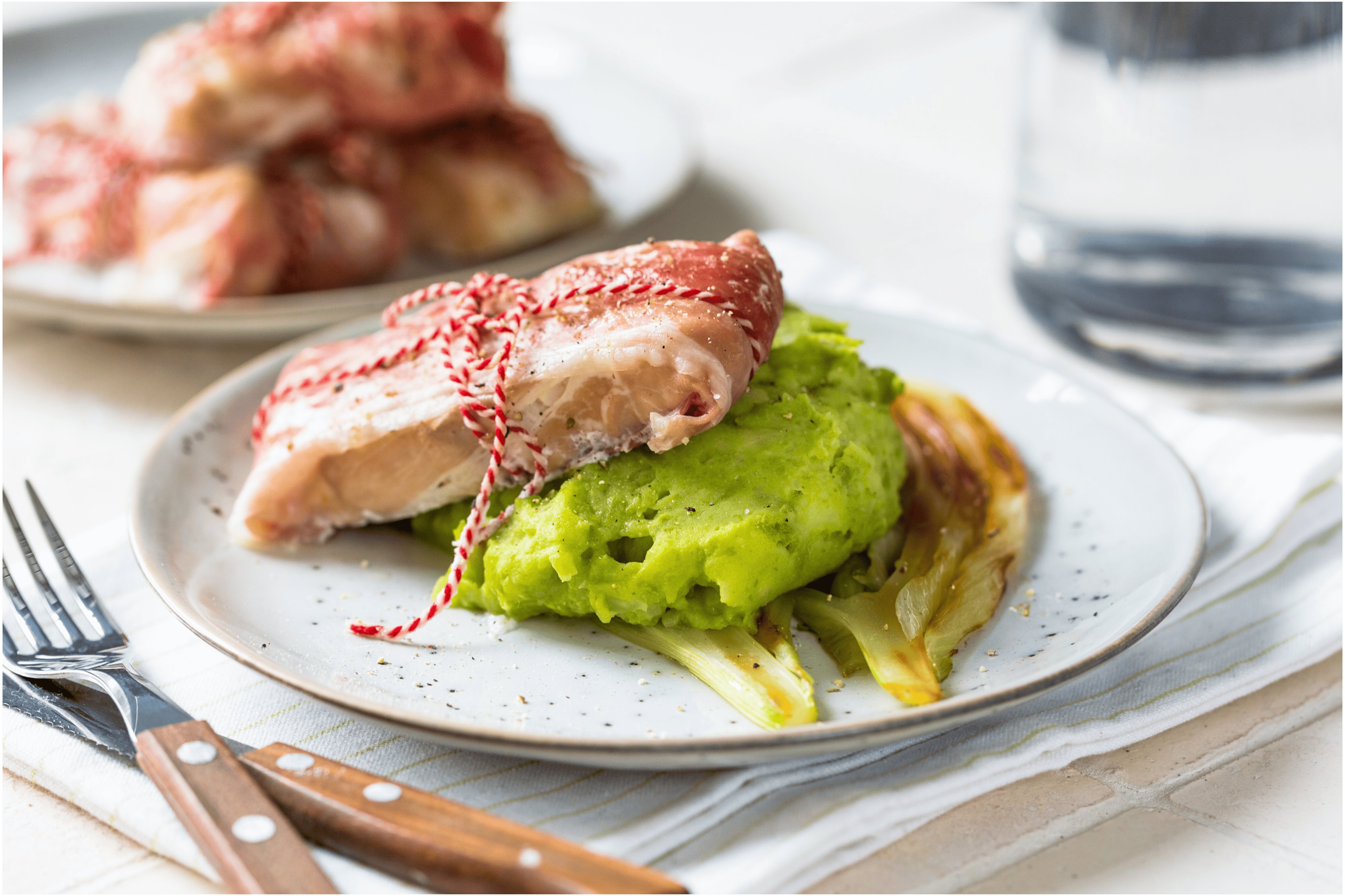 Kabeljauw met ham en venkel-doperwtenpuree