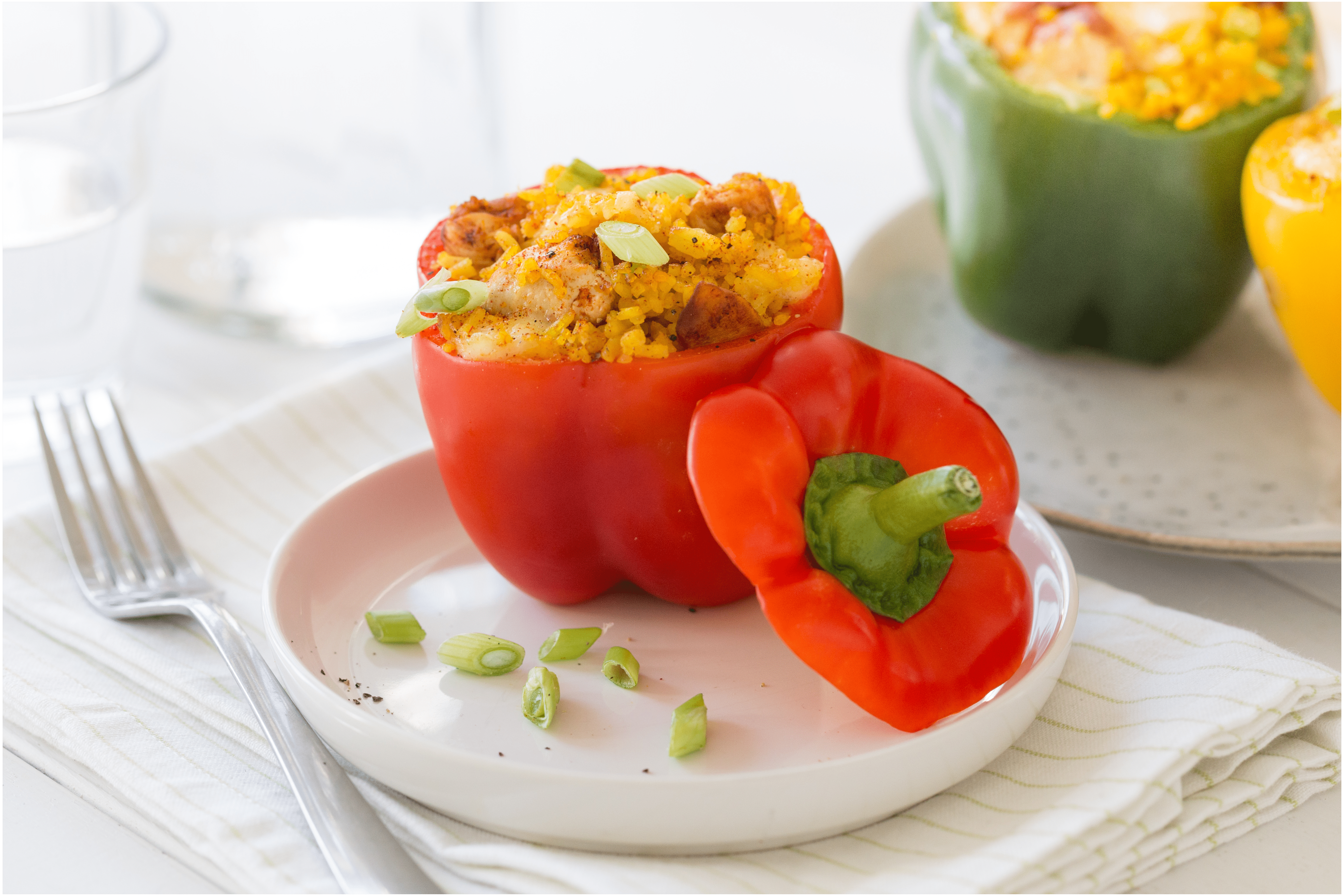 Gevulde paprika’s met kip en rijst