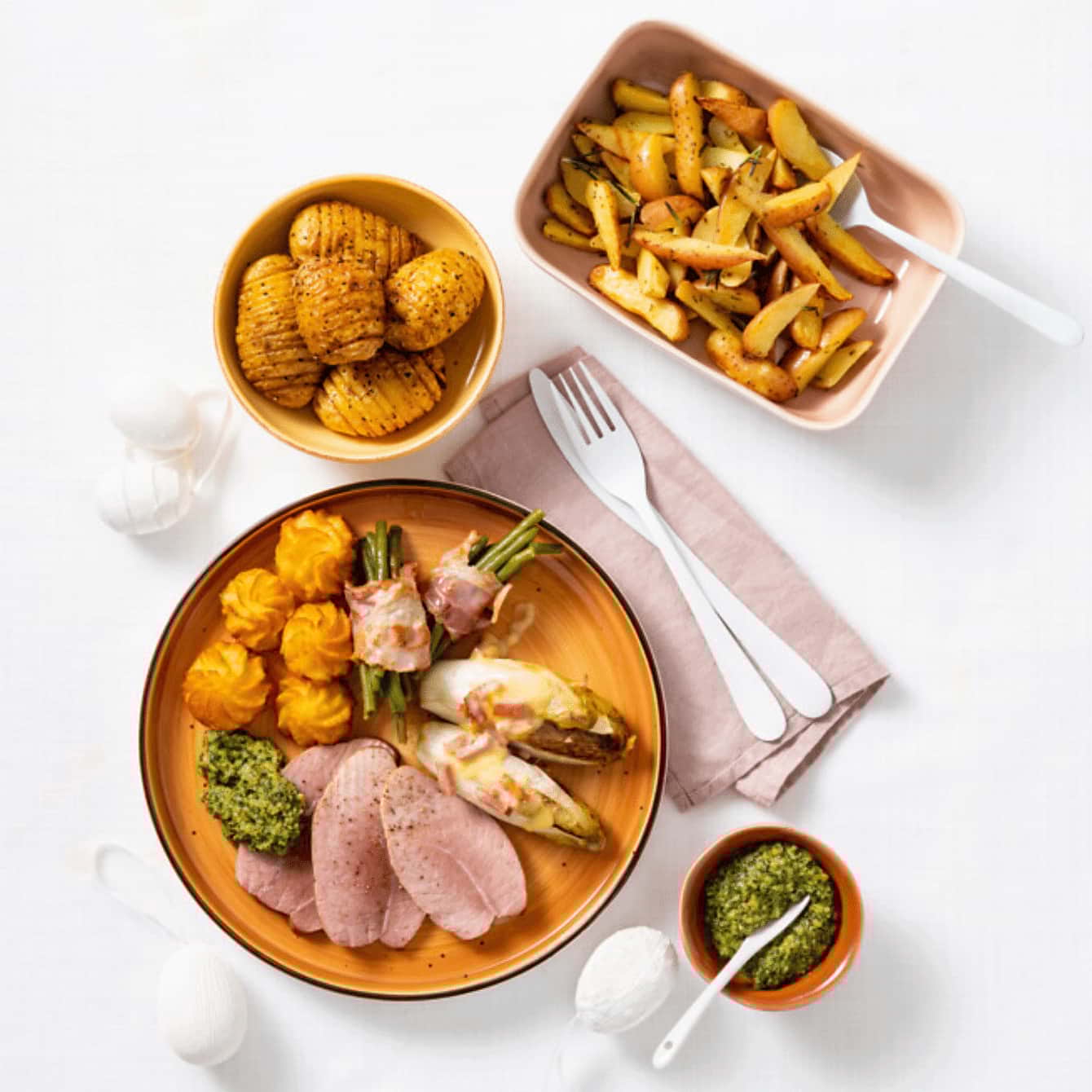 Beenham met salsa verde, gegratineerde witlof, haricots verts en pommes duaphine uit de oven