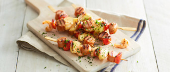 Surf ‘n turf-spies met worst en garnalen