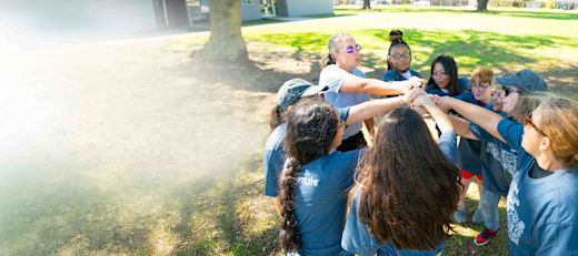 A group of young WoodmenLife volunteers huddles together
