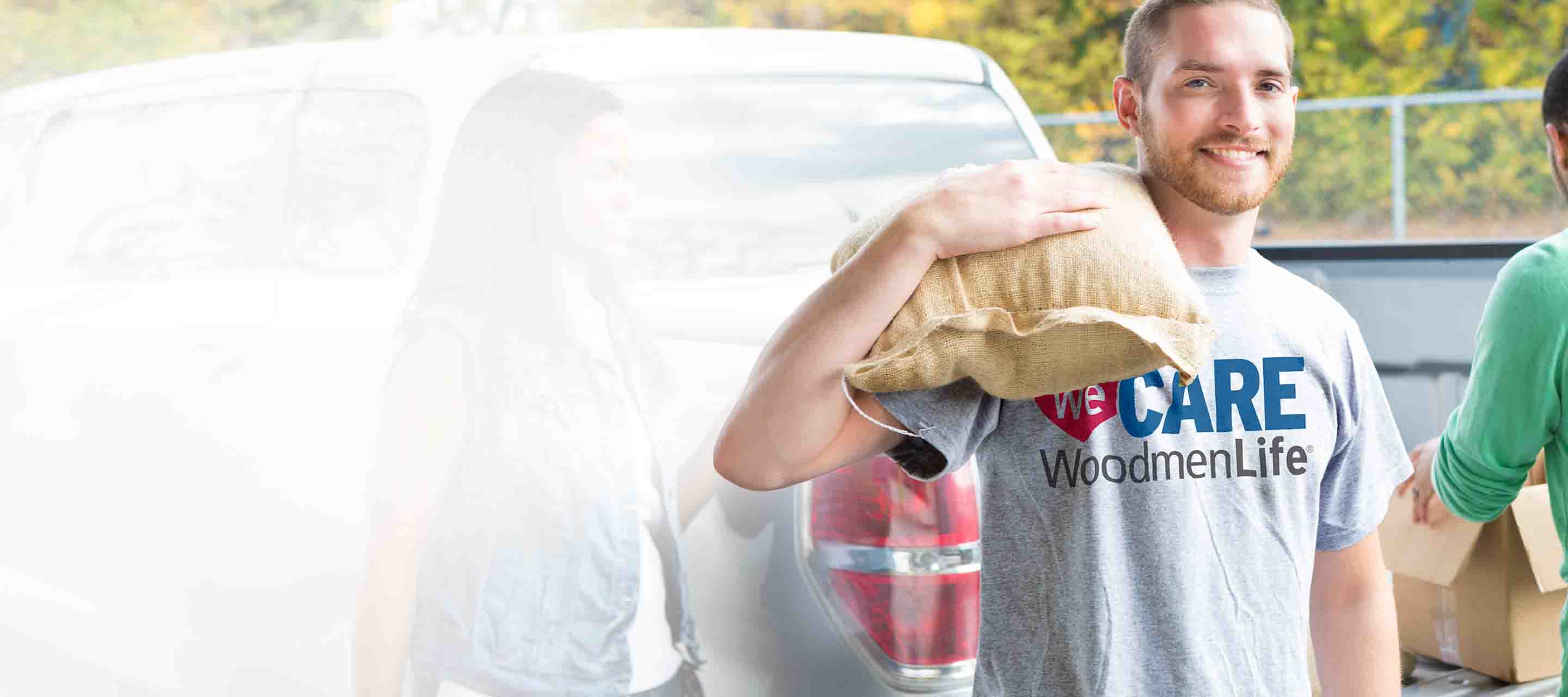 A young man helps out at local food drive