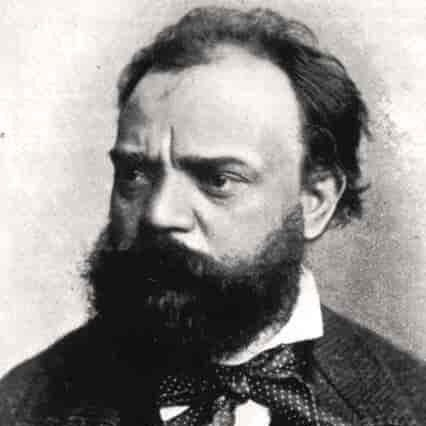 Antonin Dvořák im black and white wearing a smart suit and with a big beard