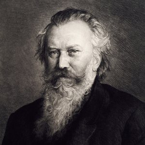 Image of Johannes Brahms looking at the camera with an impressive beard