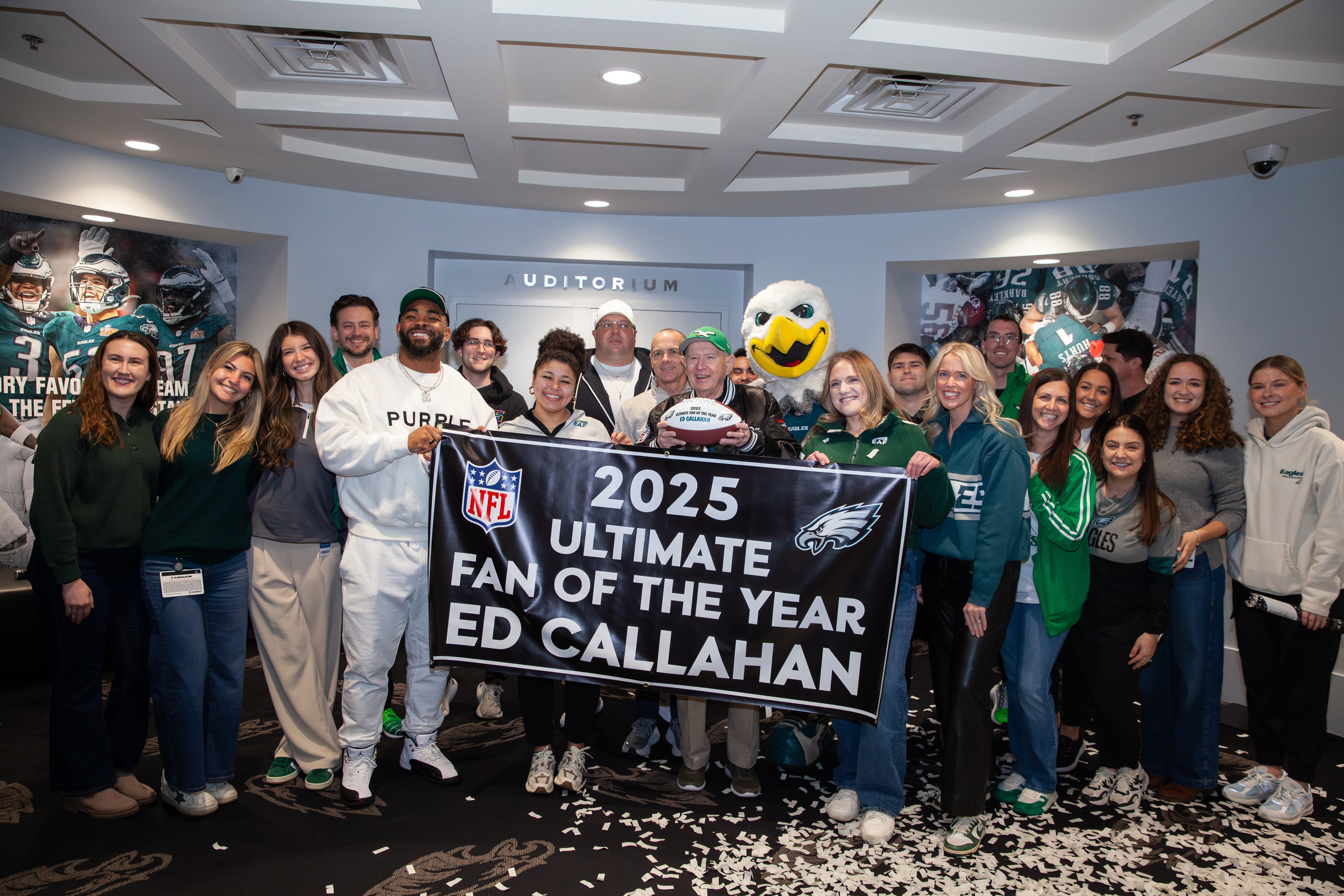 FOTY winner holding a cake