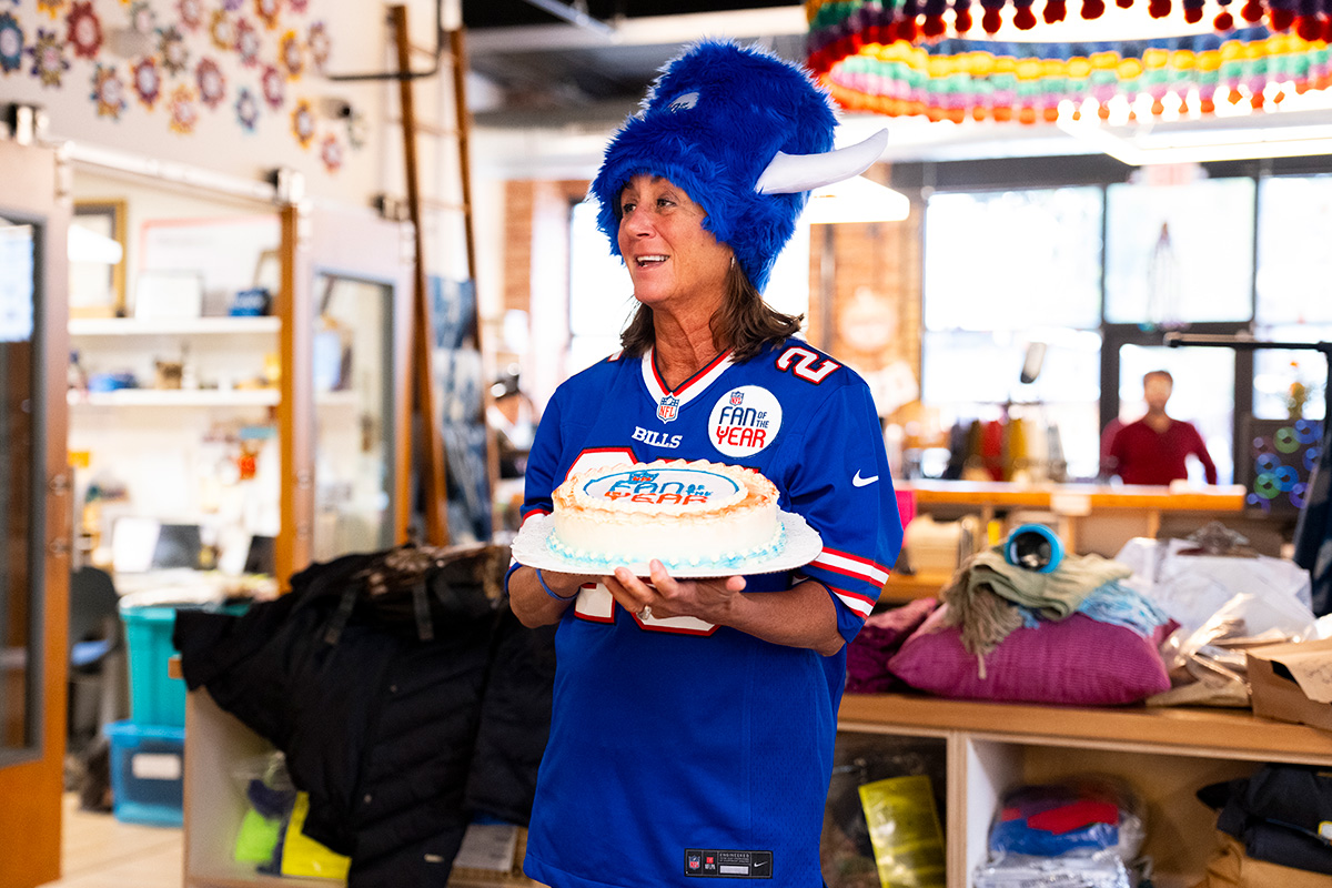FOTY winner holding a cake