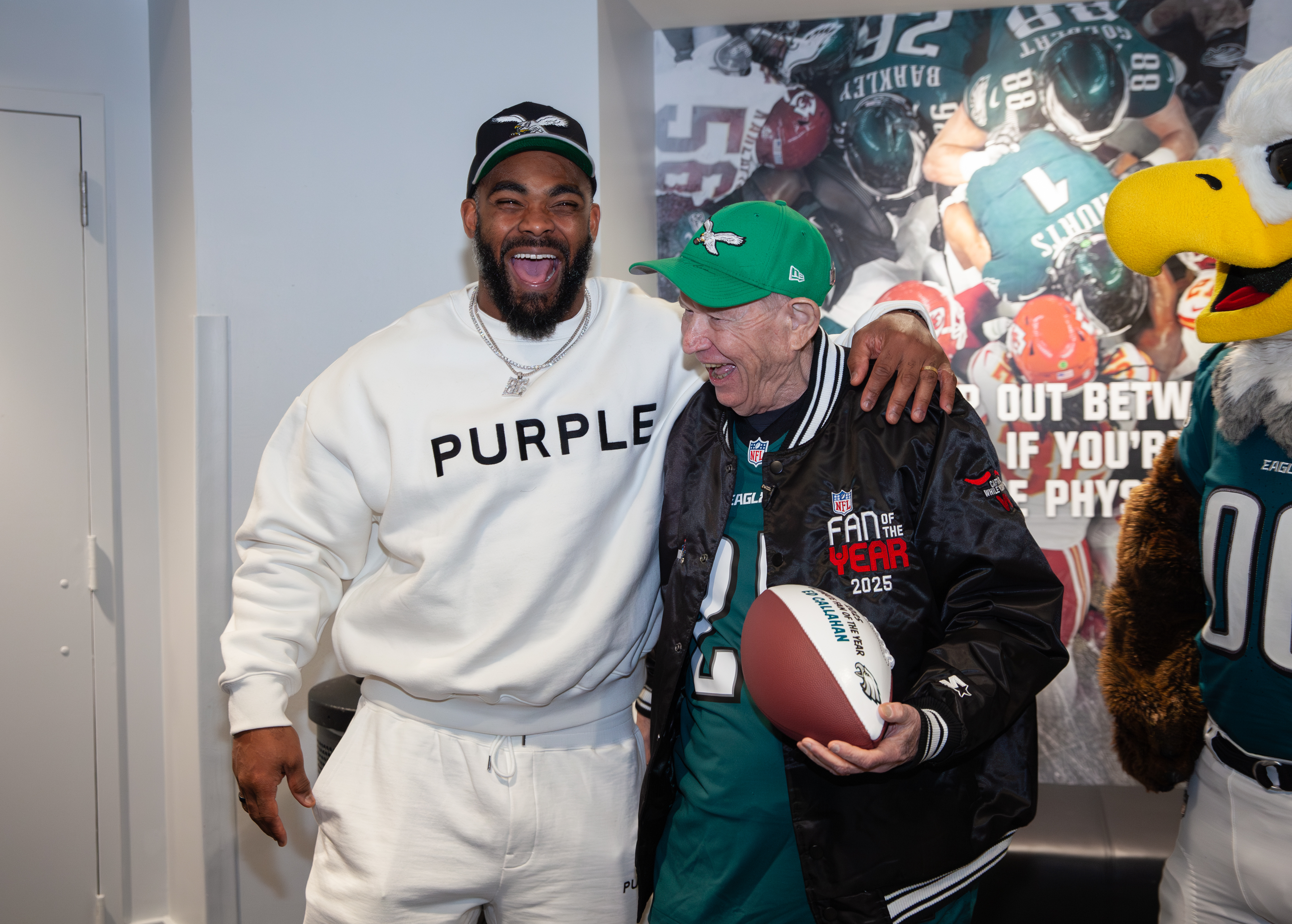 FOTY winners in a group photo holding drinks with a Captain Morgan background