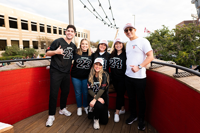 A group of people on the Captain Morgan ship deck