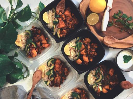 Vegetarian Curry Hot Pot, made with Quorn Mince, sweet potatoes, chickpeas, spinach, lime, beans and onion, served in bowls.