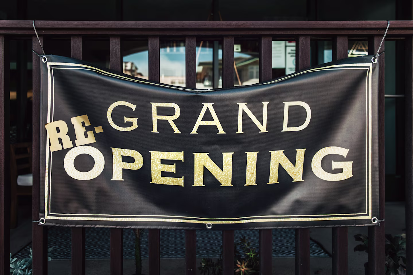 A grand re-opening sign