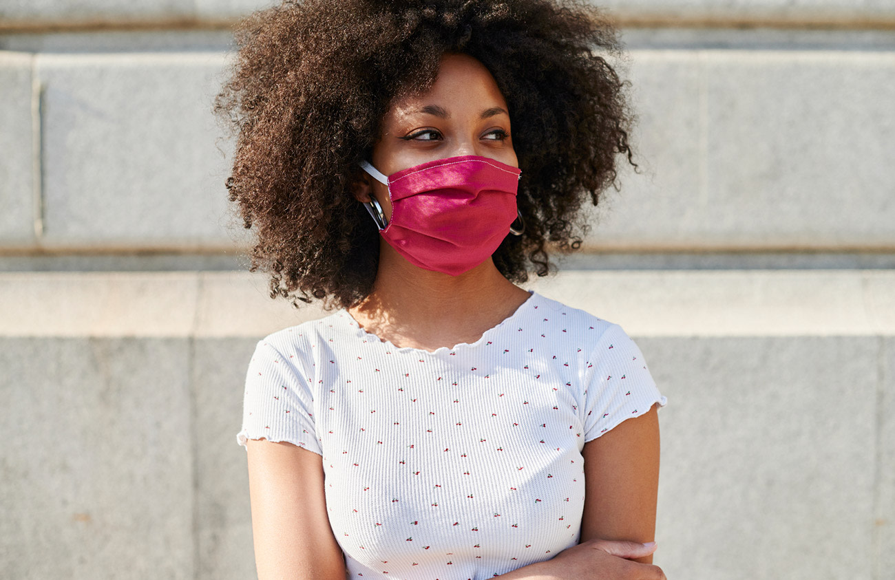 Photo of woman wearing mask