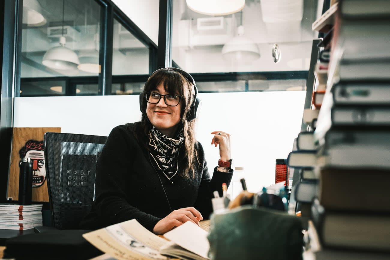 Photo of Jory Burson at her office workstation.