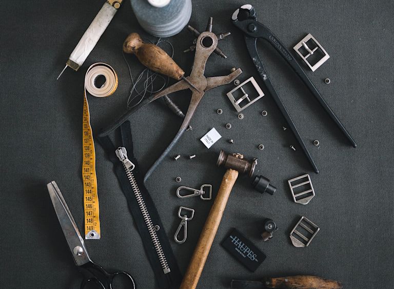 Building tools such as hammer, nails and tape measure