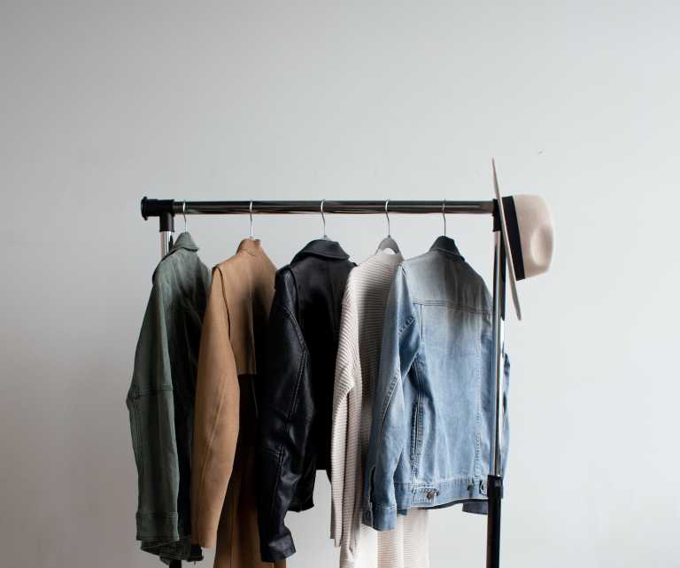 Stylish clothes on a rack 