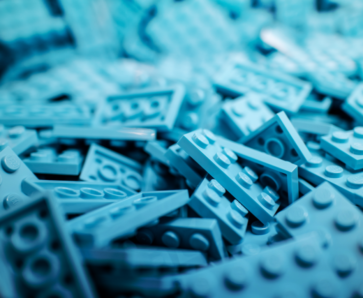 A pile of blue Lego bricks.