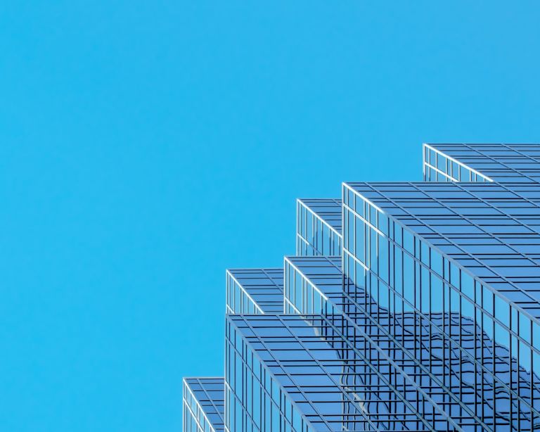 See through building with a blue sky background 