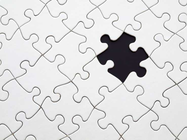 Image of a puzzle with a piece missing 