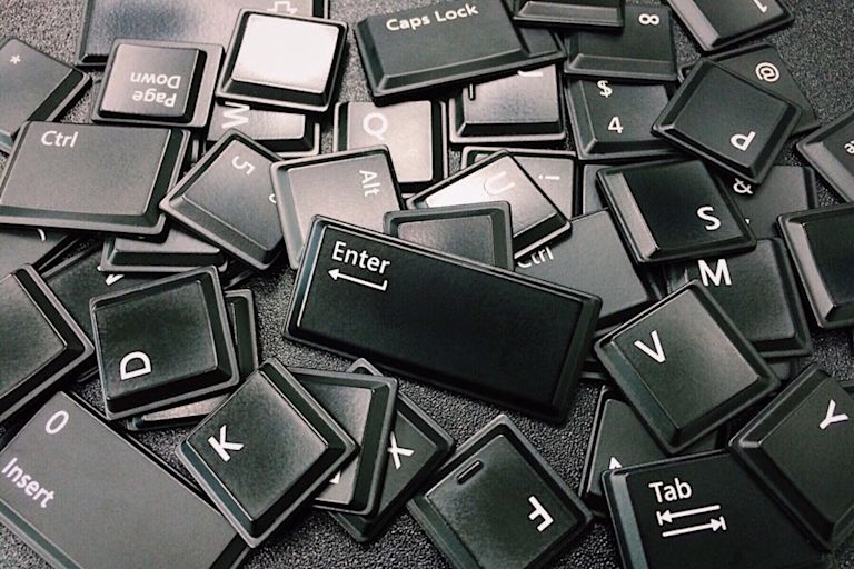 Laptop keys in a pile