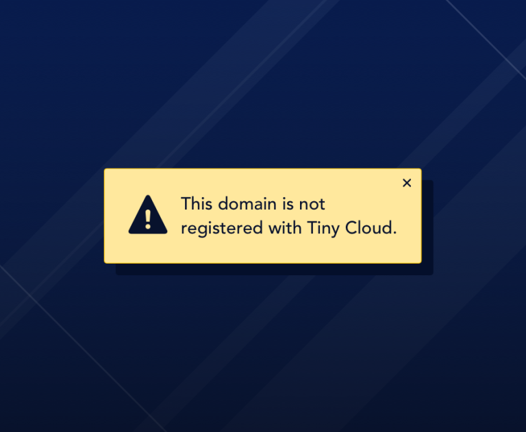 Notification message reading "This domain is not registered with Tiny Cloud."