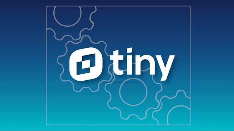 TinyMCE logo with cogs as a background representing maintenance and repair