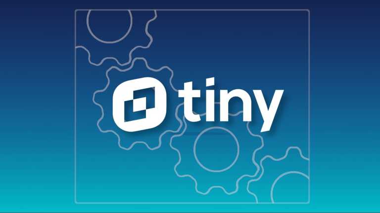 TinyMCE logo with cogs as a background representing maintenance and repair