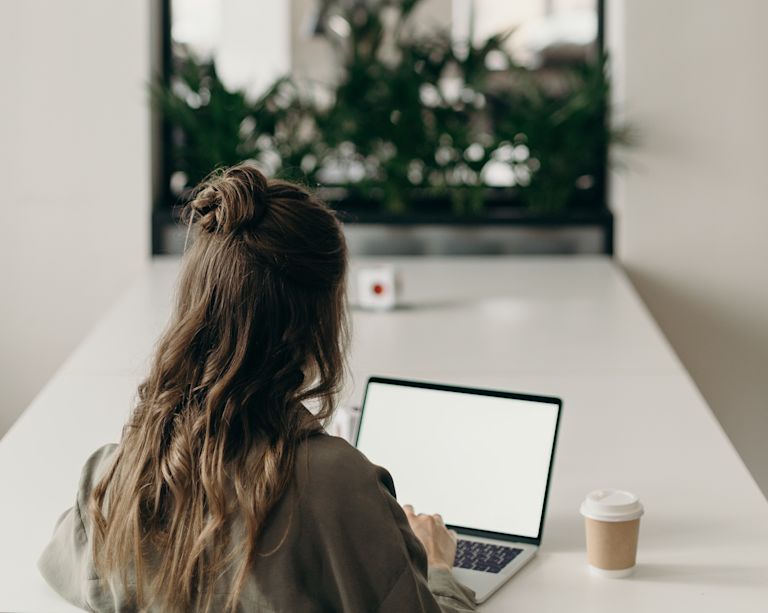 Woman working on her laptop 