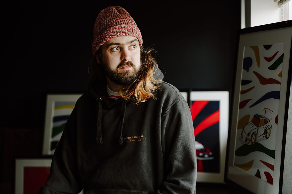 Jake Yorath, Porsche artist, in woolly hat and hoodie