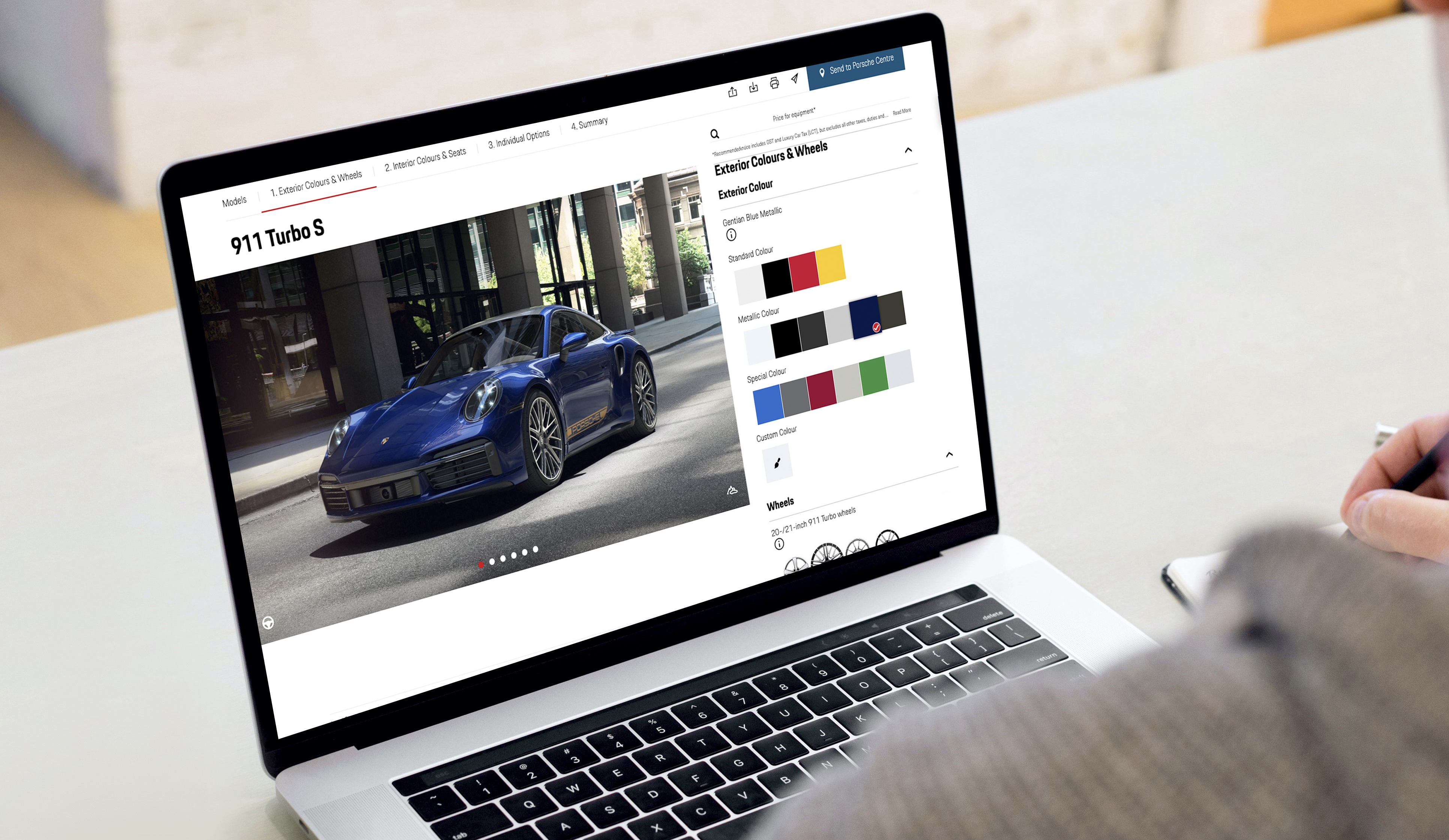 Laptop screen showing colour options for a Porsche 911 Turbo S