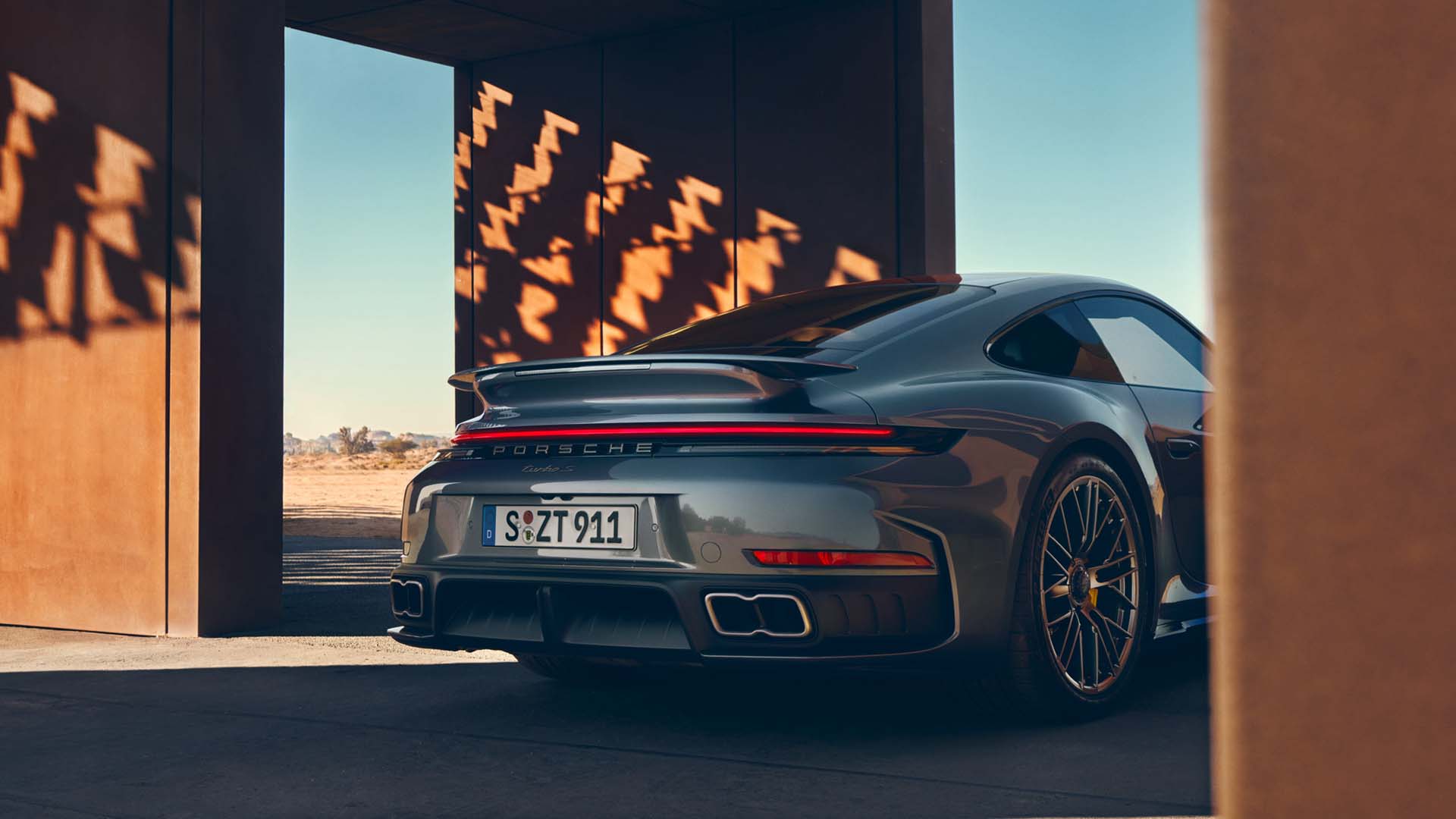 Rear three quarters view of Porsche 911 Turbo S