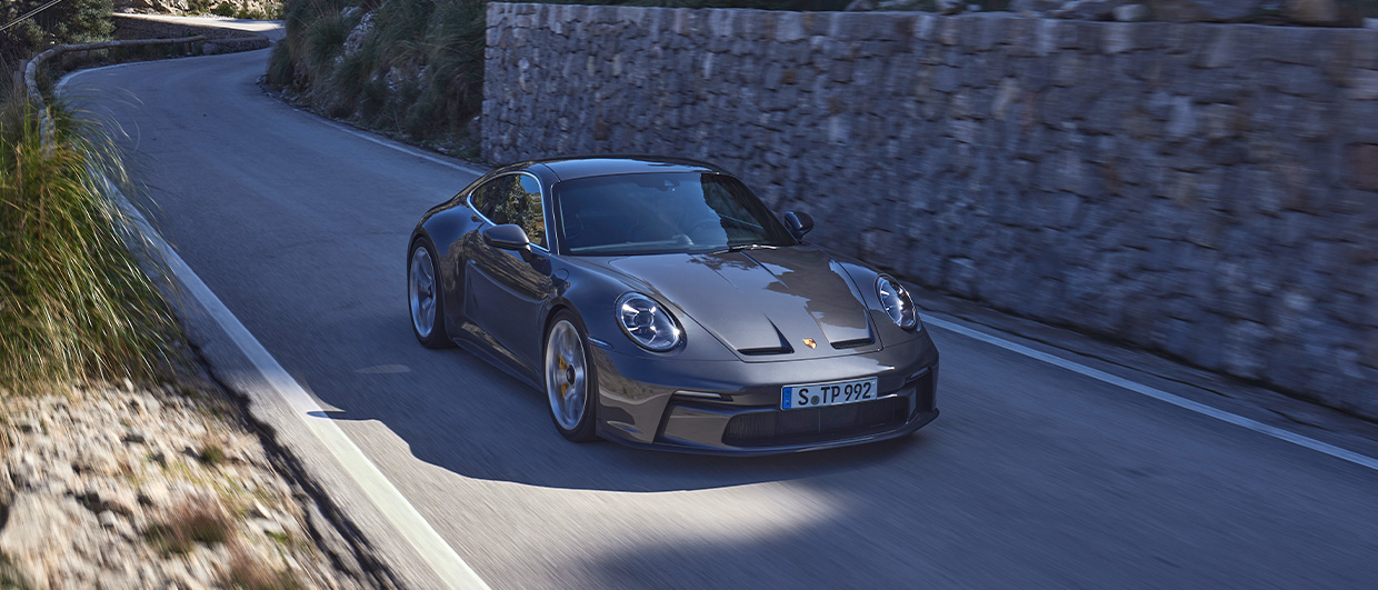 Grey Porsche 911 GT3 with Touring Package on the road