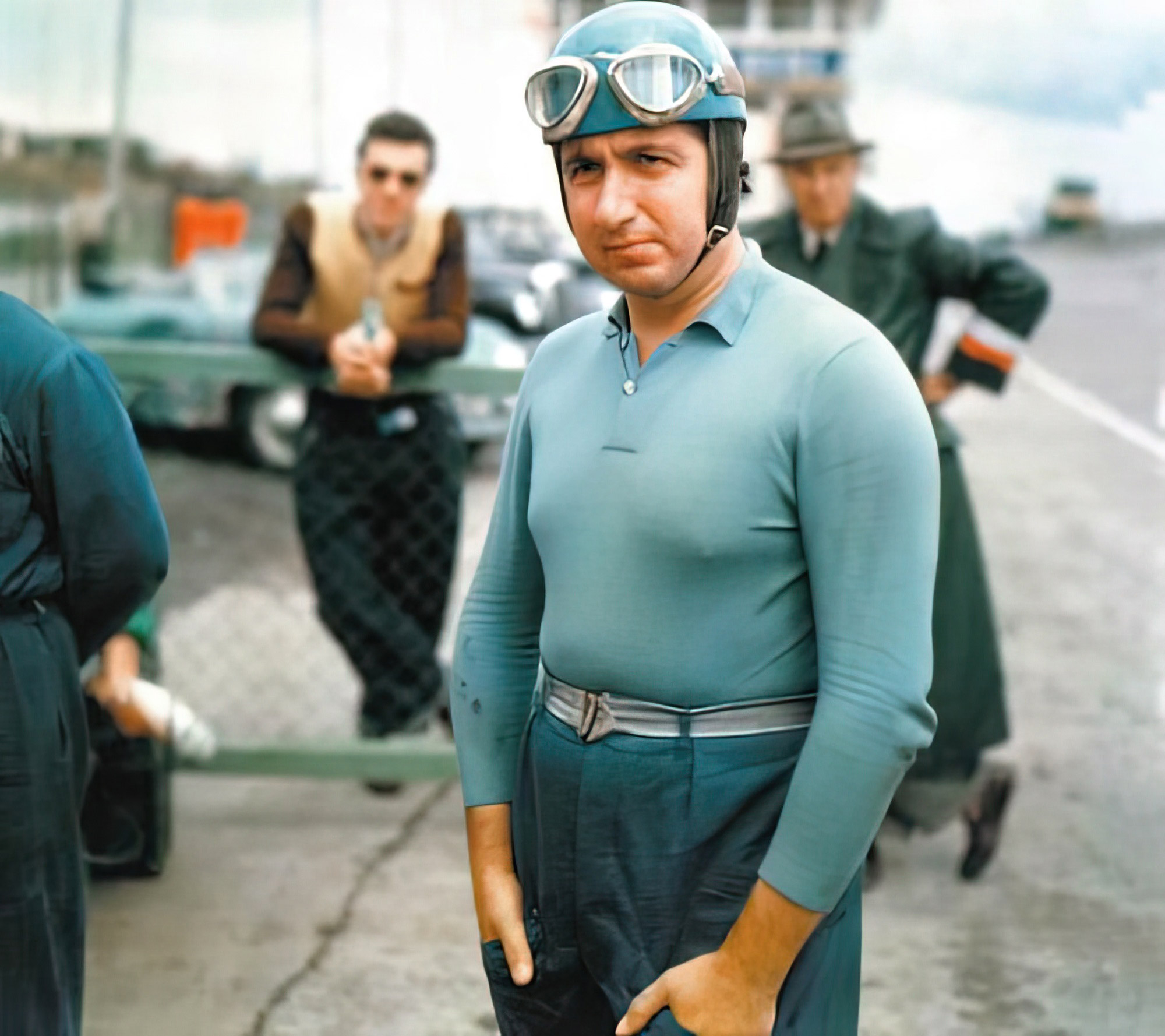 Alberto Ascari in light blue driver's clothing and helmet