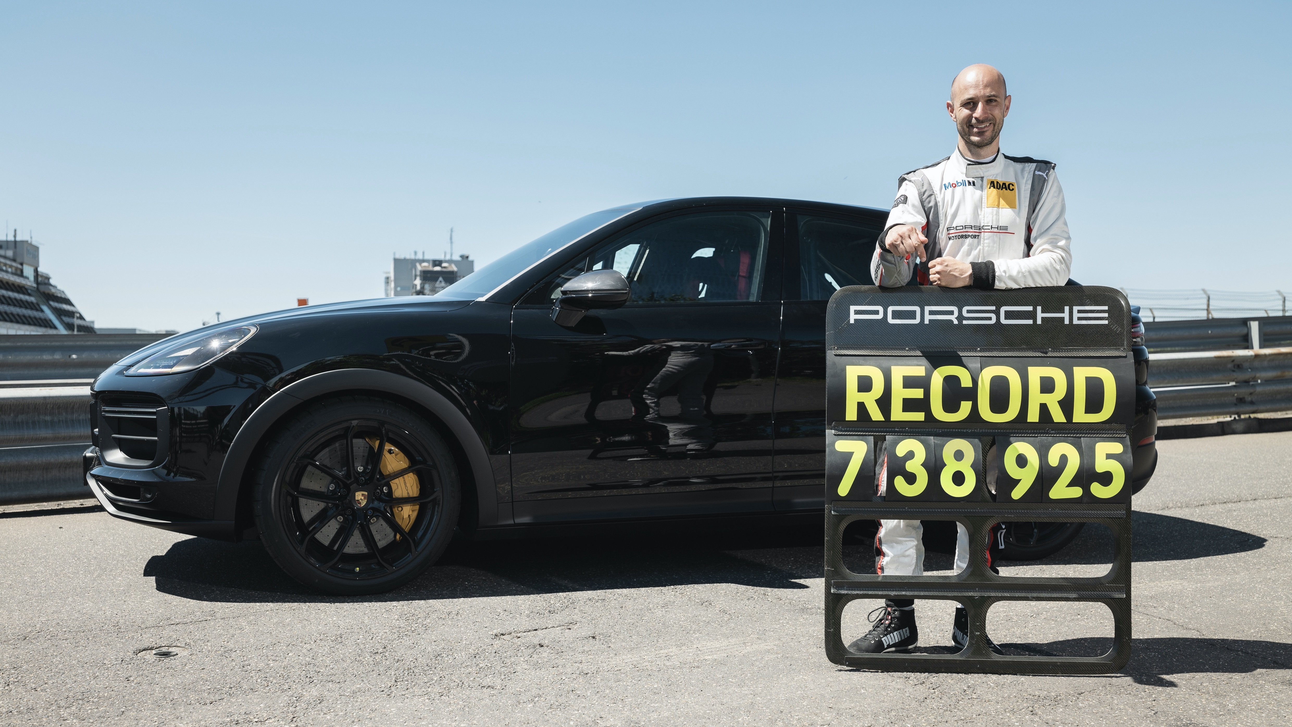 Lars Kern displays SUV lap record time next to Cayenne