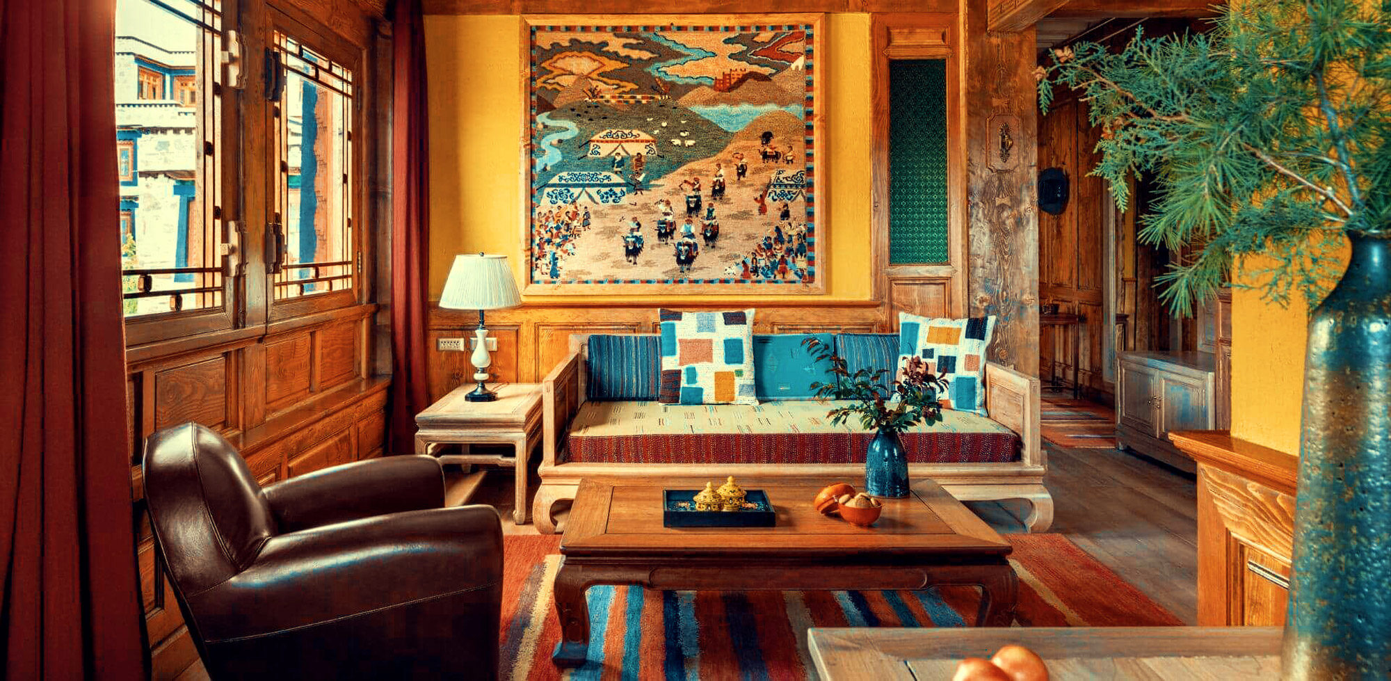 Wood-panelled hotel lobby in a traditional Tibetan style