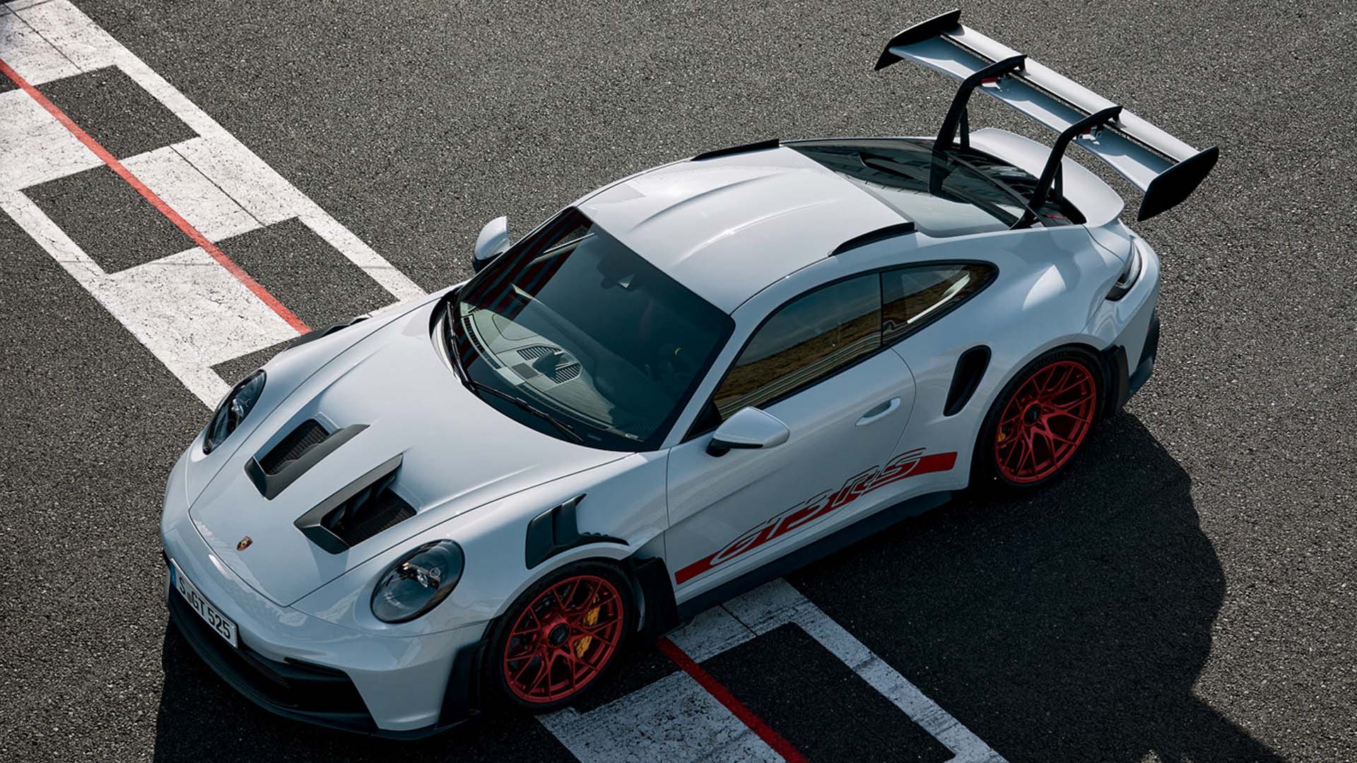 Porche 911 GT3 RS parked on racetrack wallpaper desktop 1