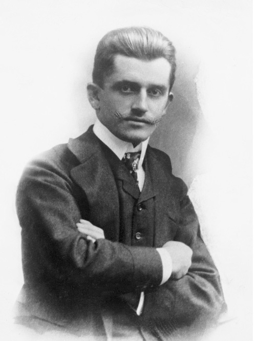 Ferdinand Porsche in the late-19th Century, arms crossed