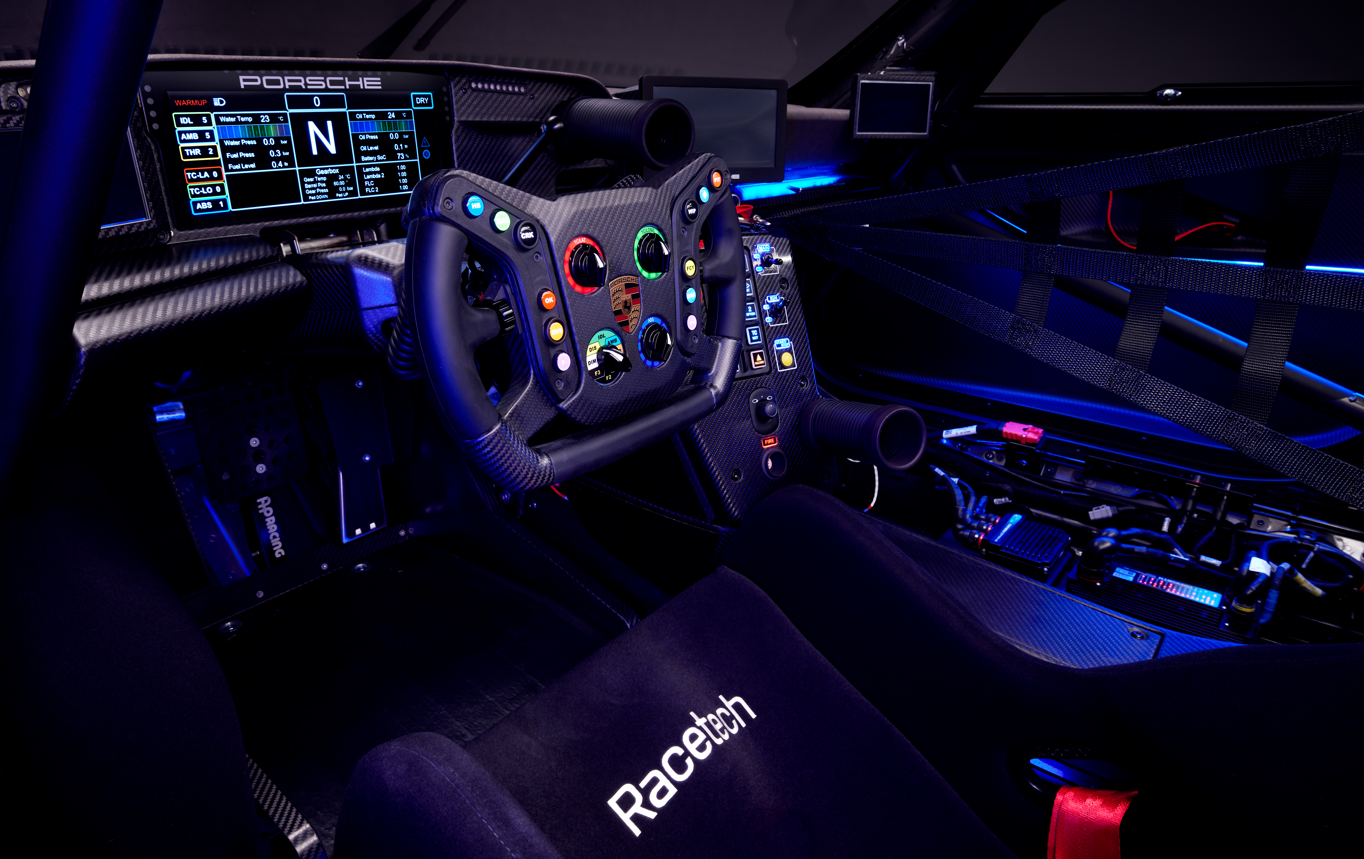 Porsche GT3 R rennsport interior, featuring dashboard and RaceTech seat