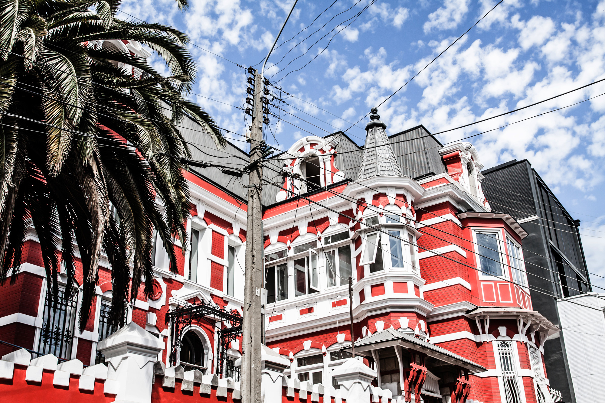 Old red and white colonial house in Valparaíso, Chile