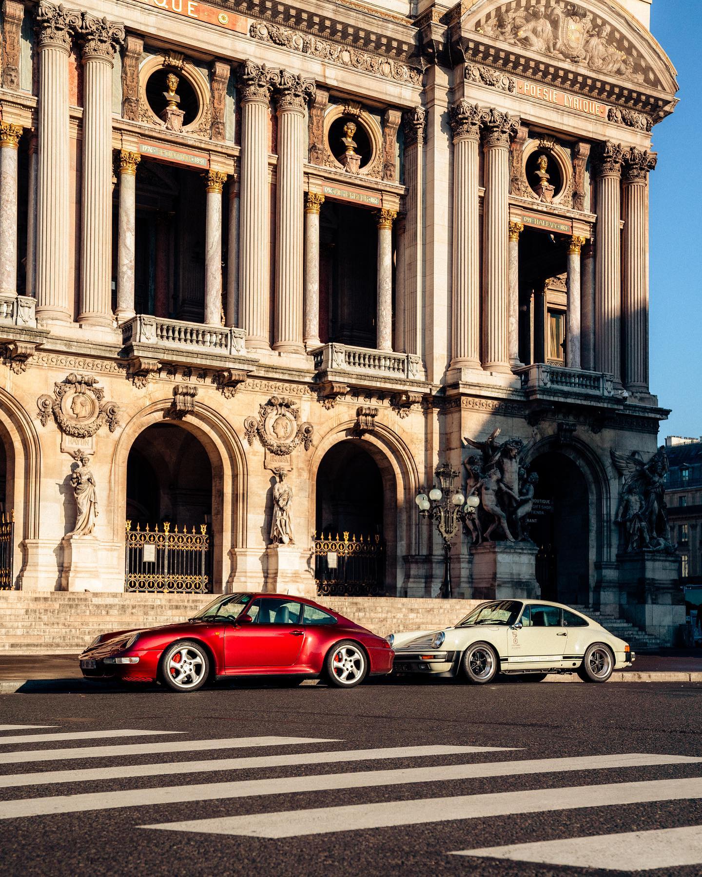 Classic Porsche 911 cars in front of Palais Garnier, Paris