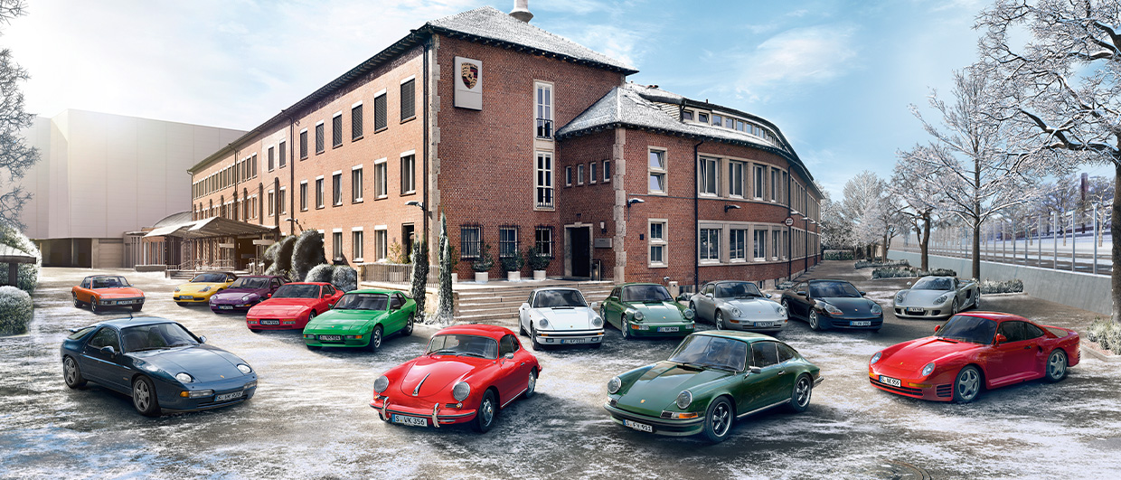 Line-up of classic Porsche cars in the snow