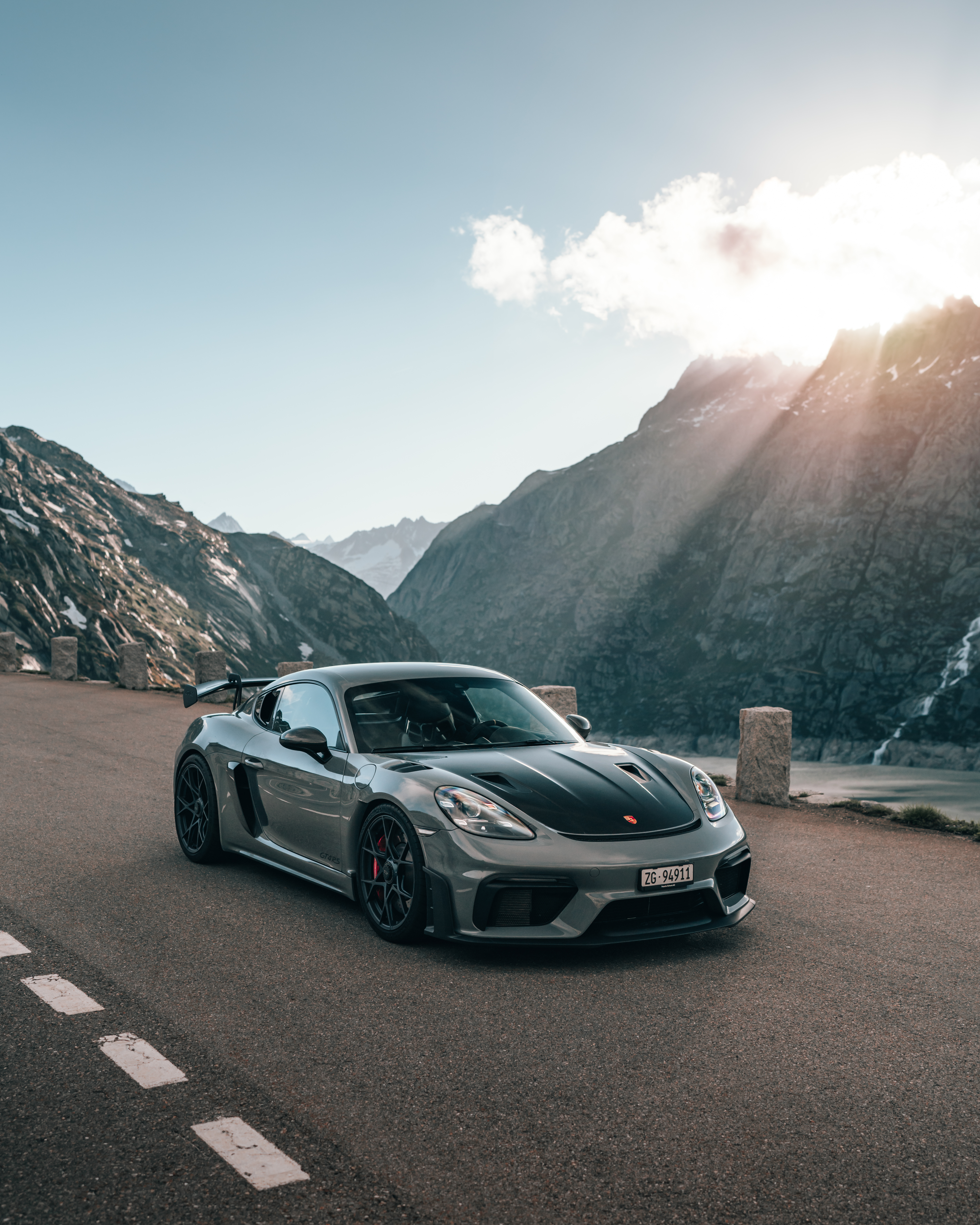 Porsche 718 Cayman GT4 RS ¬in lay-by, mountains behind it