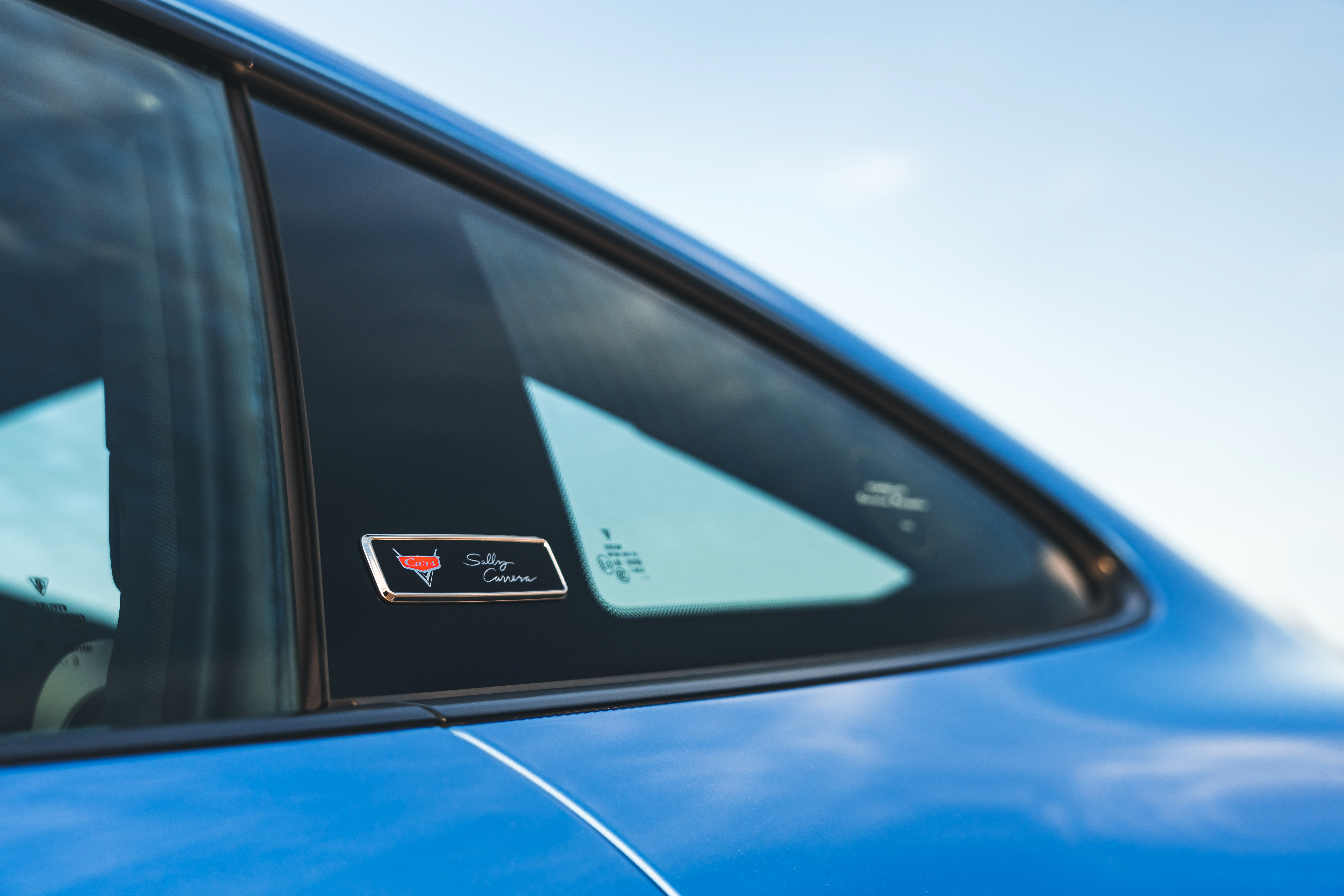Cars’ Sally Carrera badge on Porsche 911 Sally Special B-pillar