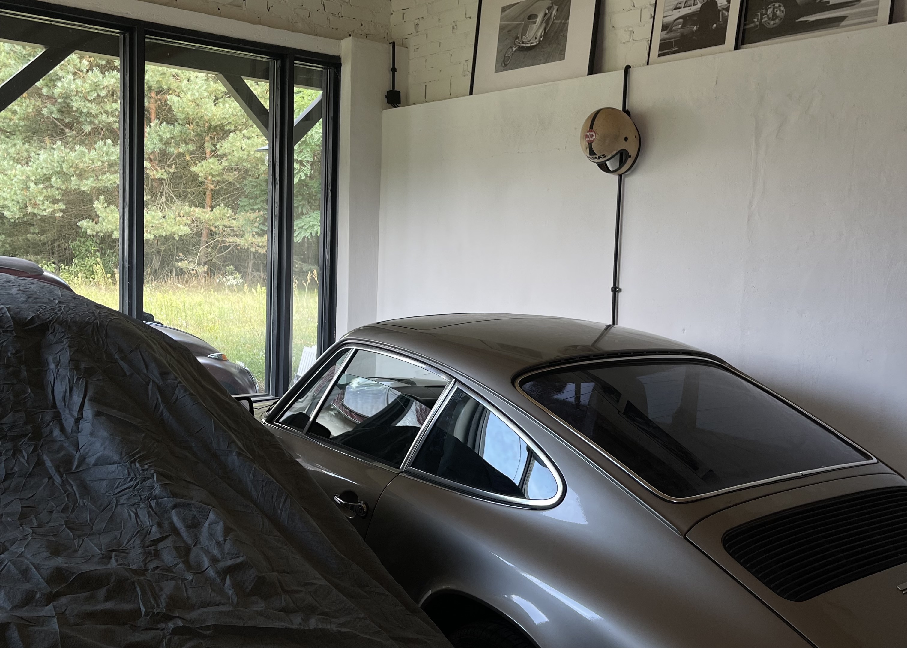 View of Porsche 911 S (G-model) from side and rear, parked in garage