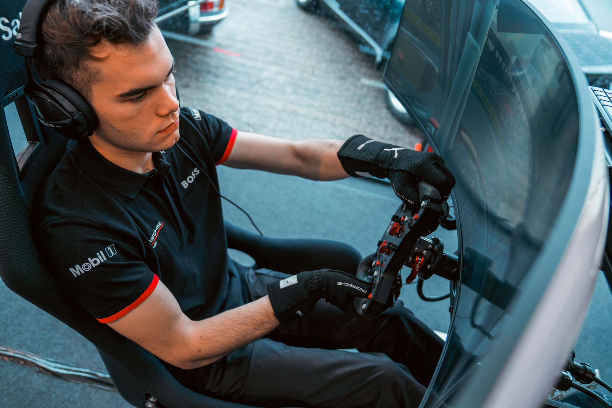 eSport/Porsche Supercup driver Laurin Heinrich driving on a simulator