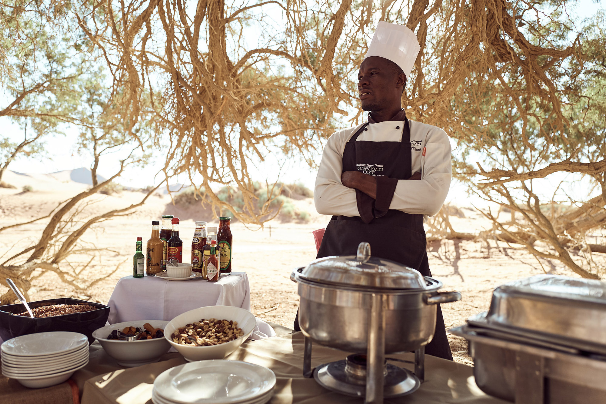 Chef at the breakfast buffet in the desert