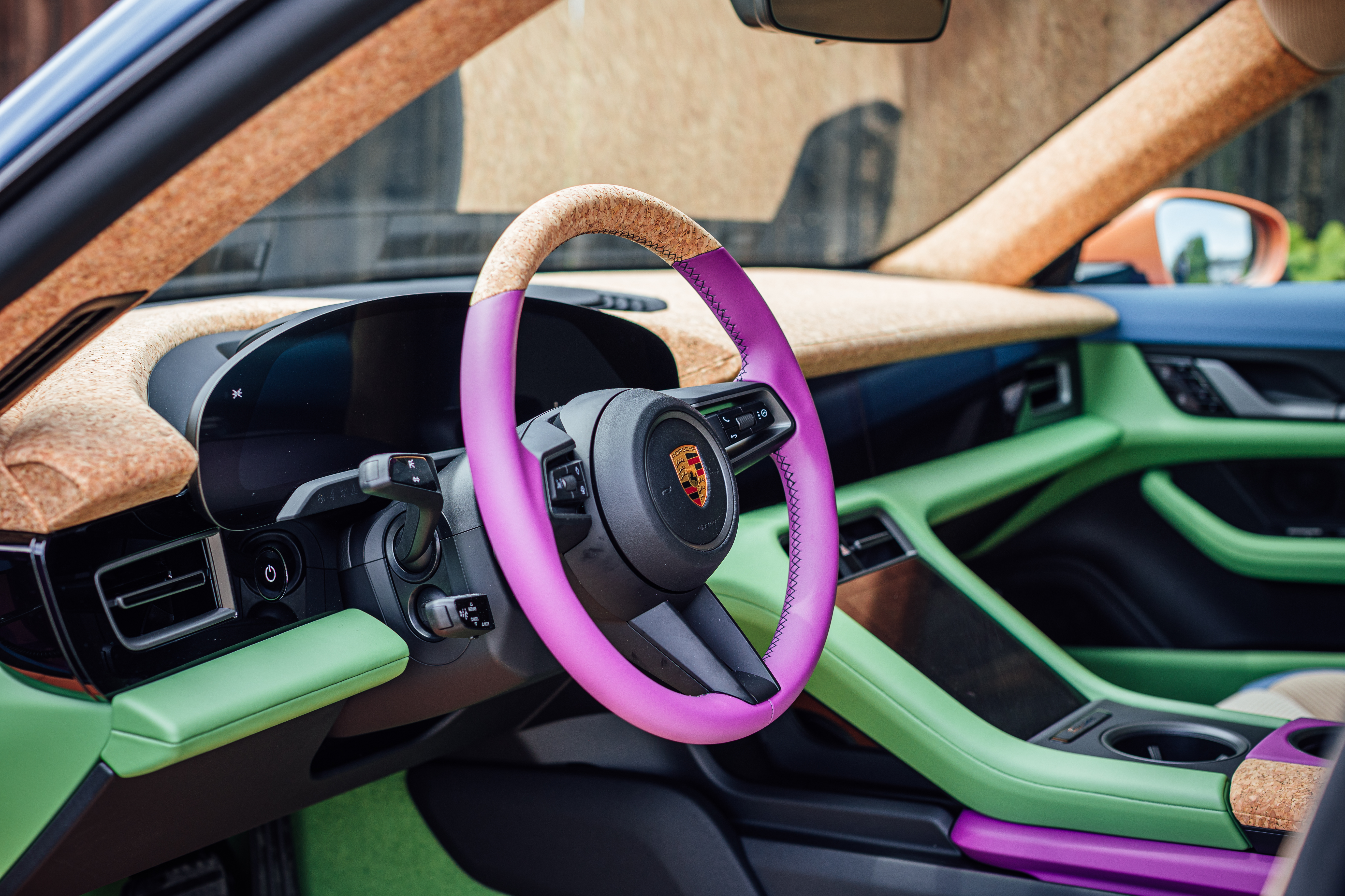 Colourful Taycan art car interior: cork steering wheel and dashboard