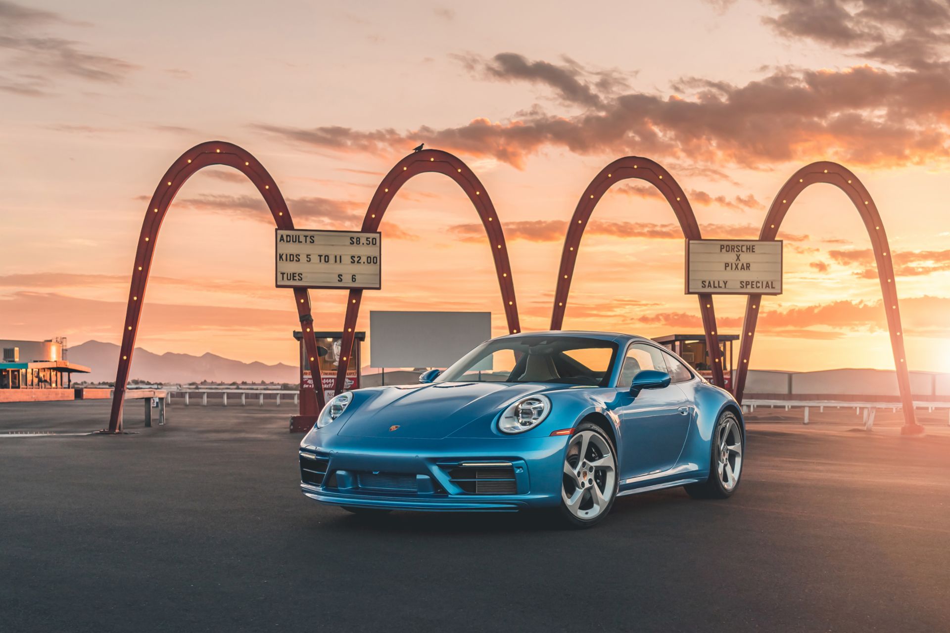 Blue Porsche 911 Sally Special at sunset in US desert